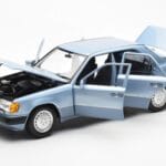 Mercedes 230E W124 Hellblau Metallic Norev 1:18 - image 2 of 8