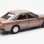 Mercedes 230E W124 Rosewood Metallic Händler Edition Norev 1:18 - image 3 of 8