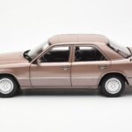 Mercedes 230E W124 Rosewood Metallic Händler Edition Norev 1:18 - image 4 of 8