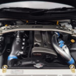 Nissan Skyline GT-R R34 Nismo Z-Tune Weiß MotorHelix 1:18 - image 9 of 11